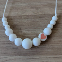 Collier Enfant, grande sœur